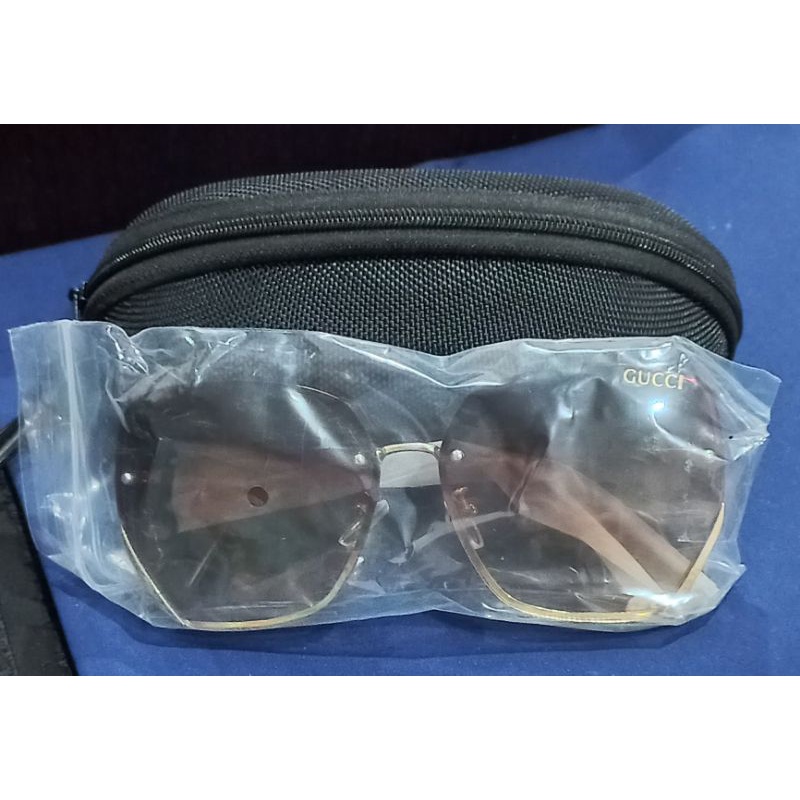 kacamata import gucci