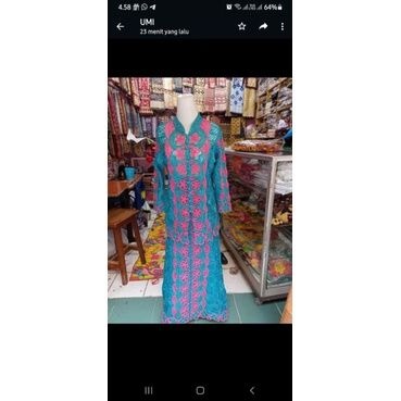 Tapis baju usus sulaman tangan