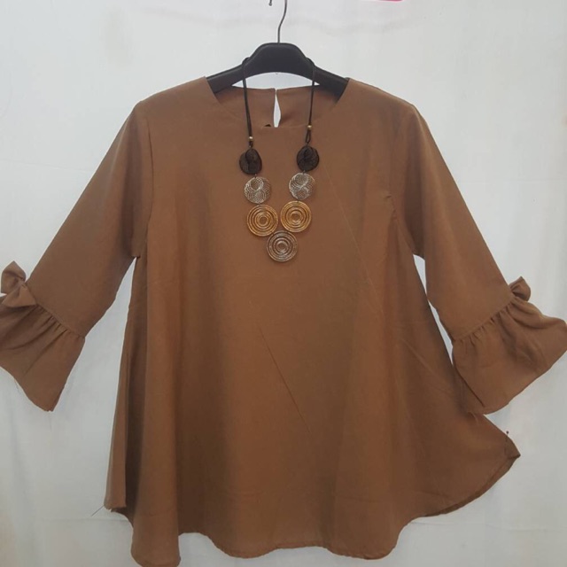 Blouse supernova terlaris