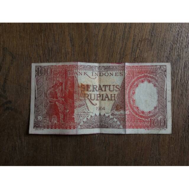 UANG KERTAS / UANG LAMA / UANG KUNO DENGAN NOMINAL 100 RUPIAH KELUARAN TAHUN 1964 BANK INDONESIA
