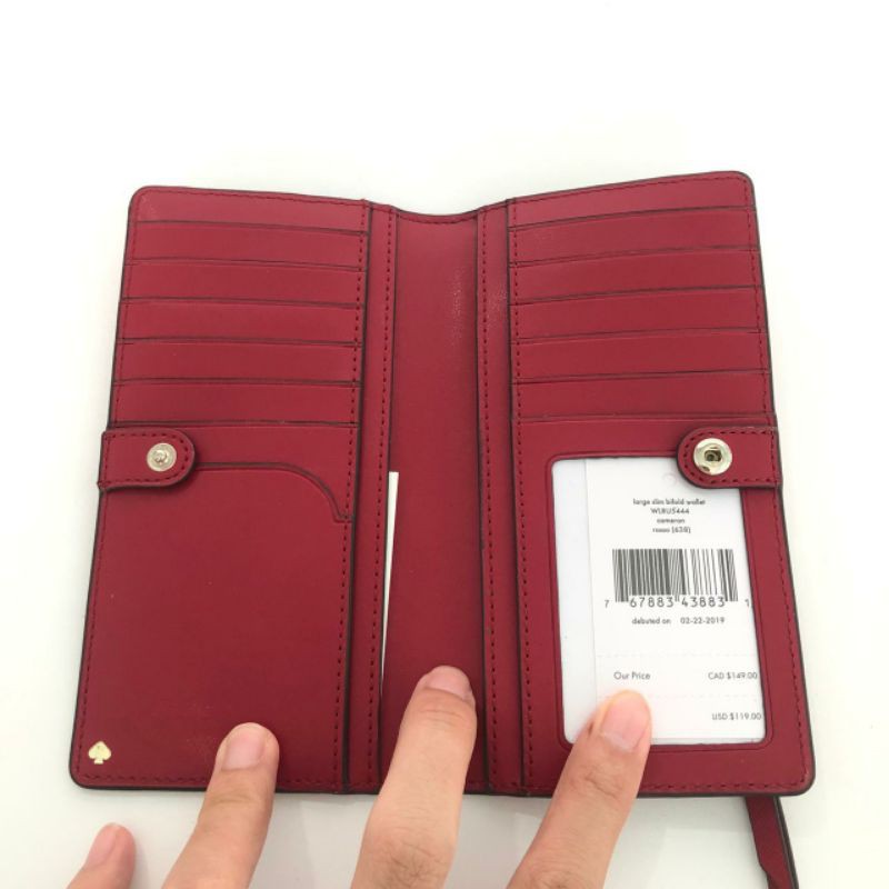 dompet katespade large slim bifold wallet cameron rosso