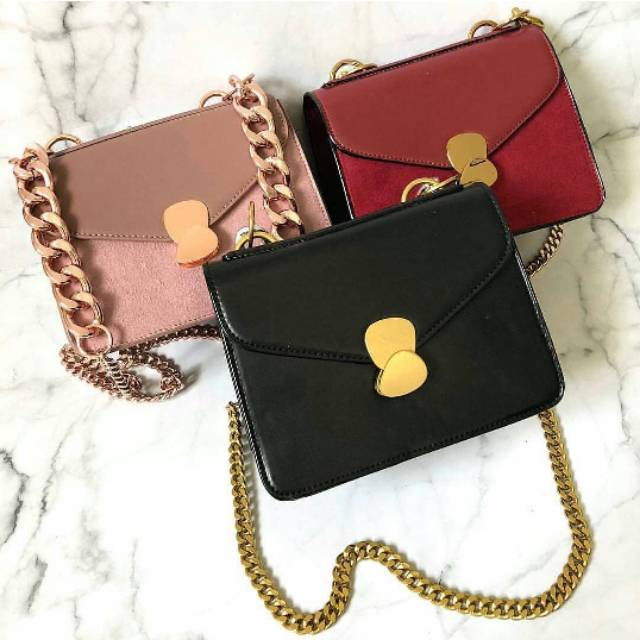 CK METAL DETAIL FRONT FLAP BAG