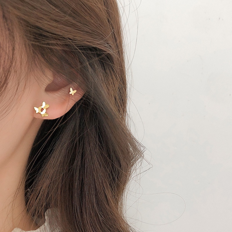 We Flower Anting Stud Desain Kupu-Kupu Asimetris Bahan S925 Silver Gaya Korea Untuk Wanita