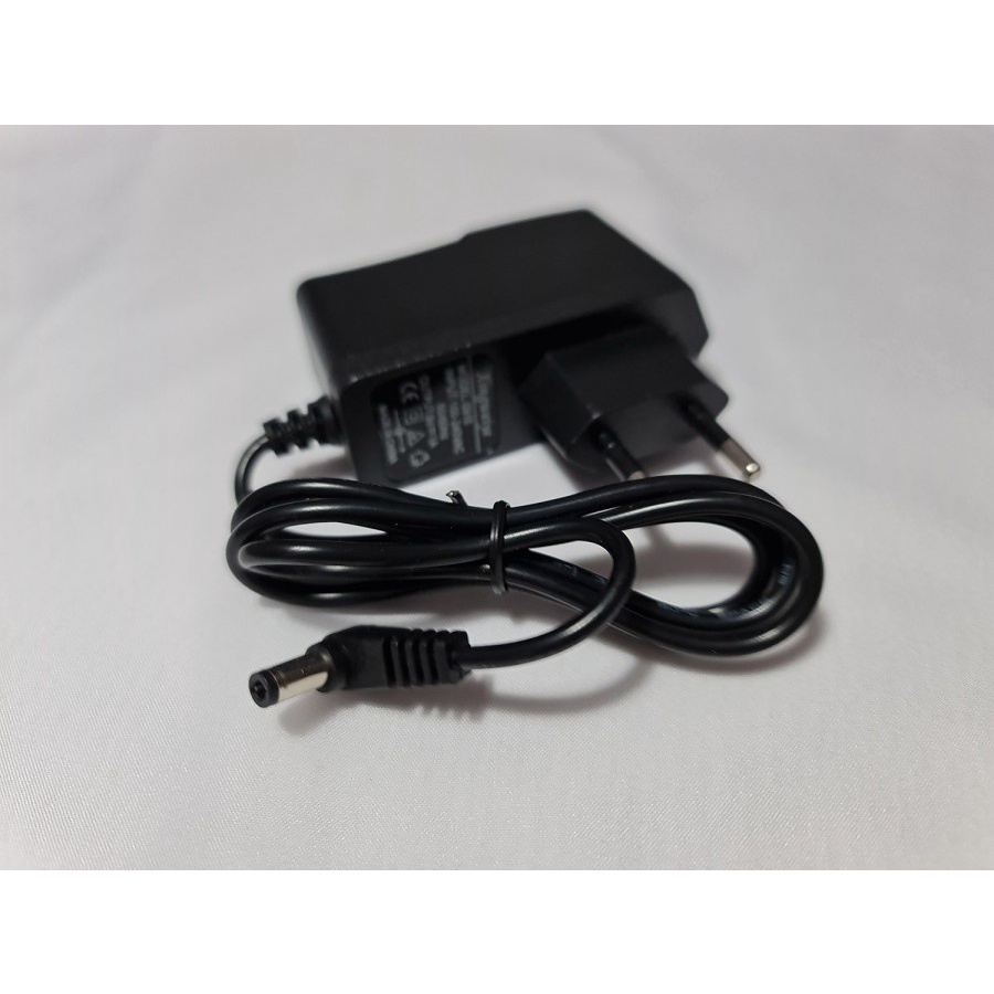 adaptor 9v 1a kepala bengkok - ID adaptor switching 9 volt 1 ampere