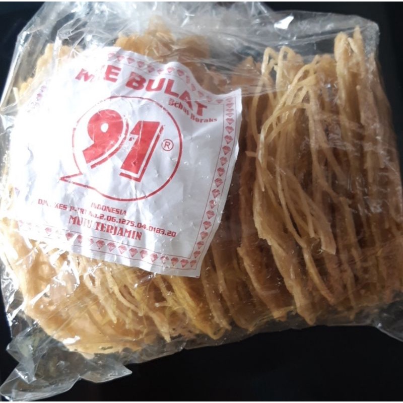 

KERUPUK MIE BULAT CAP 91 UKURAN JUMBO UK. 1 KG / KERUPUK MI LINGKAR MIE KOA MENTAH OLEH OLEH KHAS MEDAN