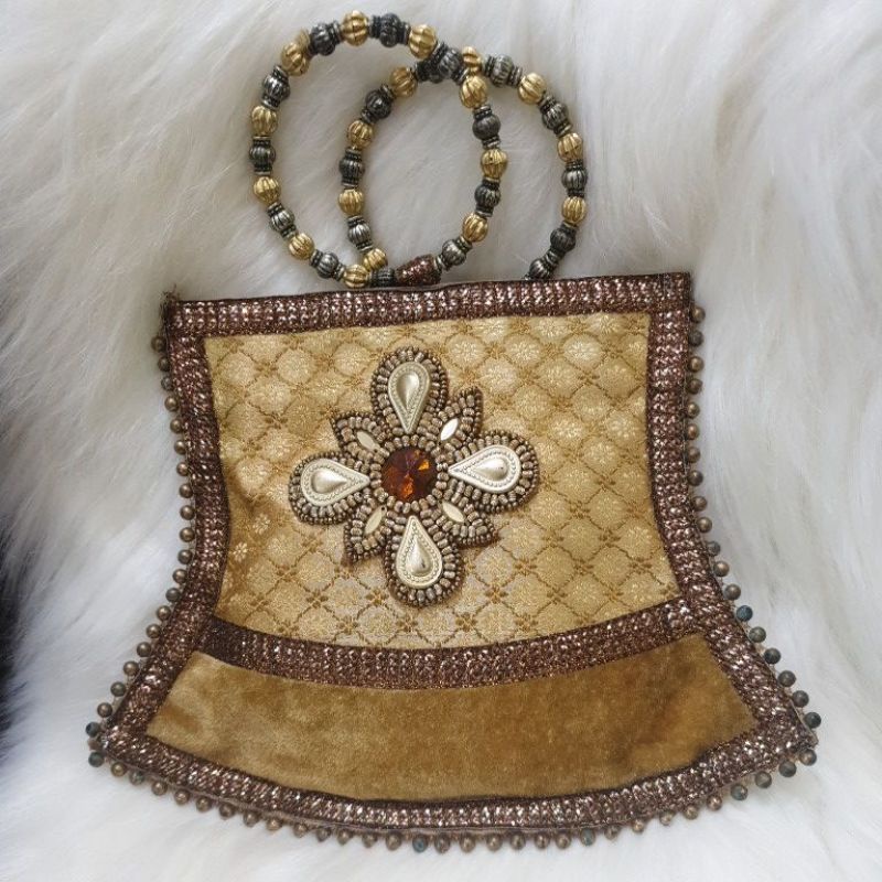 DOMPET ETNIK PRELOVED