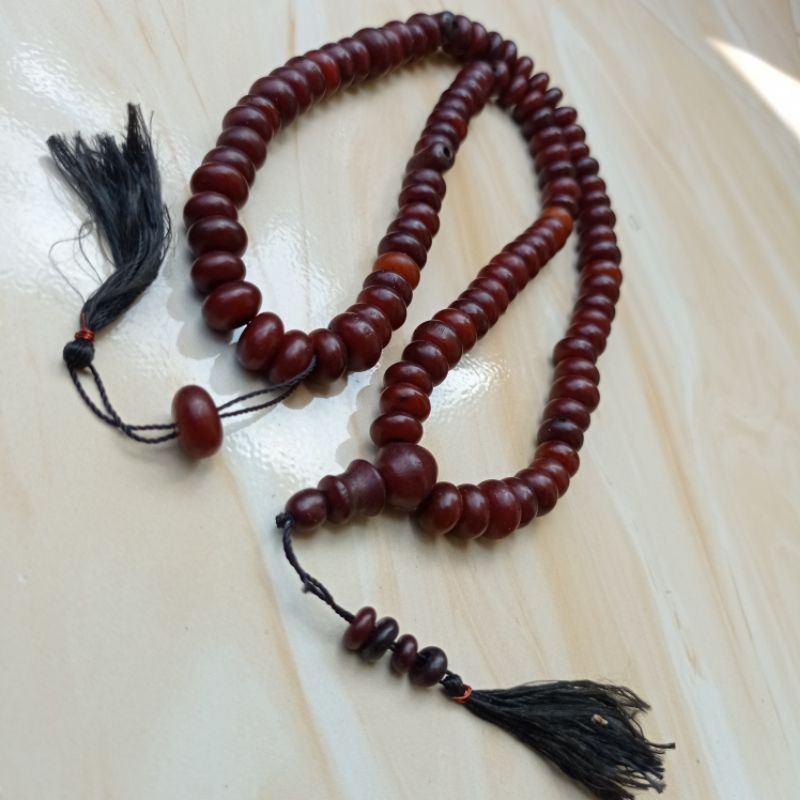 tasbih 99 biji pocok / biji buah gebang warna merah maron