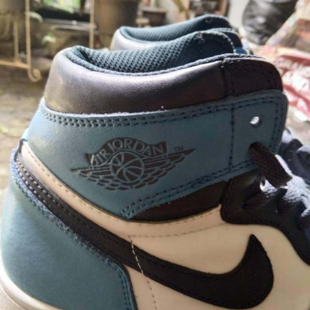 Sepatu air jordan retro unc blue obsidian