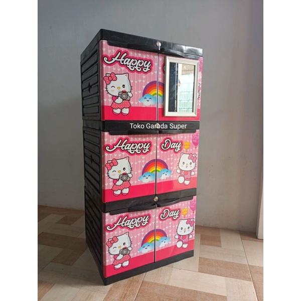 Lemari Plastik Diva Mini Sticker Kaca Susun  Karakter Doraemon & Hello Kitty