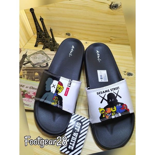 SANDAL SLIDE KAWS SUPREME SESAME / SANDAL SELOP KAWS GRADE ORI