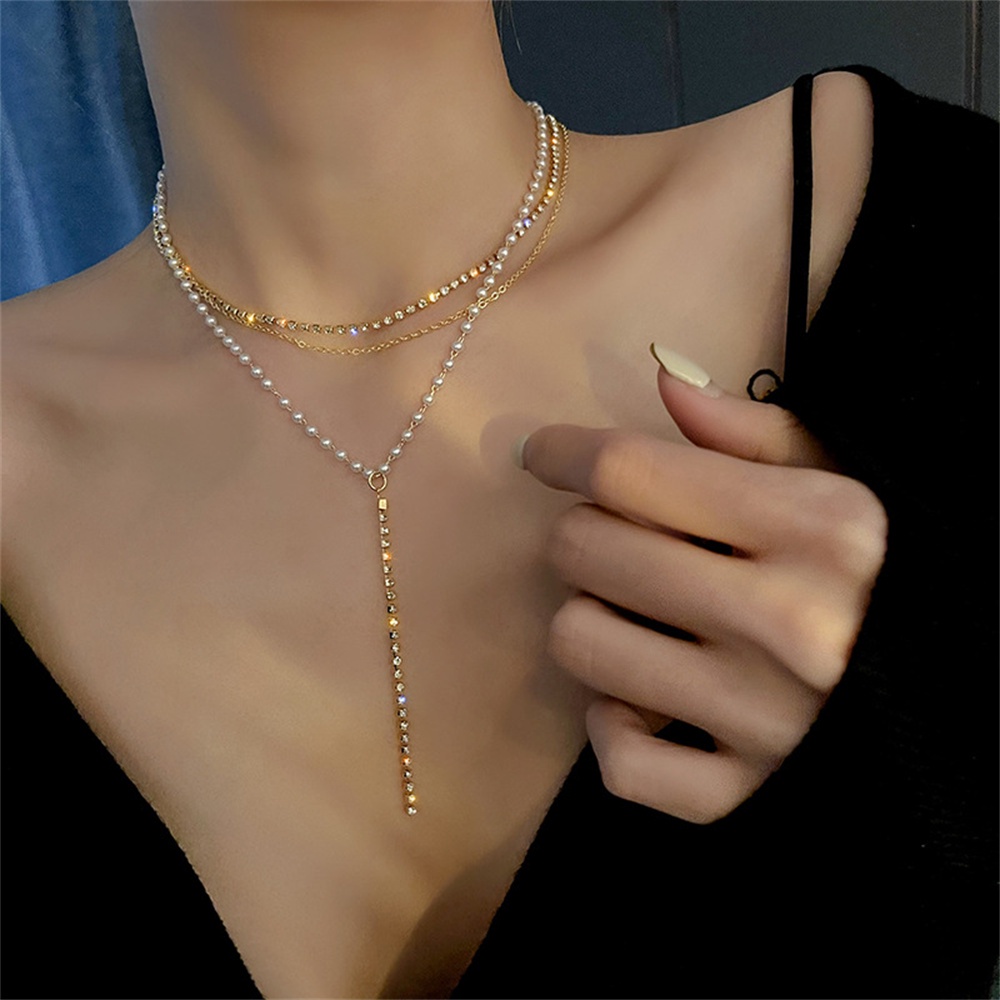 Kalung Rantai Multilayer Hias Mutiara Bahan Zirkon Gaya retro Untuk Wanita