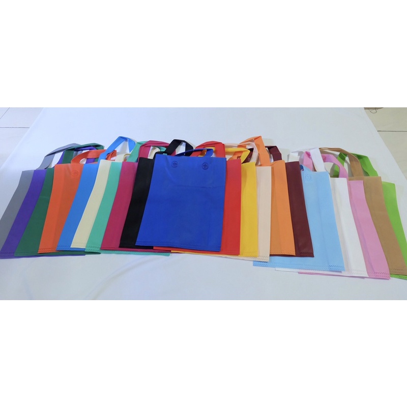 

tas kain spunbound tenteng warna warni size 30x40 isi 12