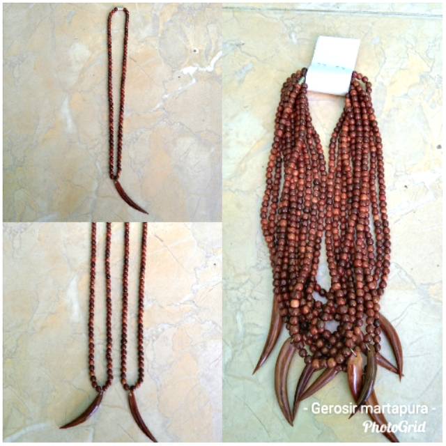 Kalung kokka liontin motif Taring singa