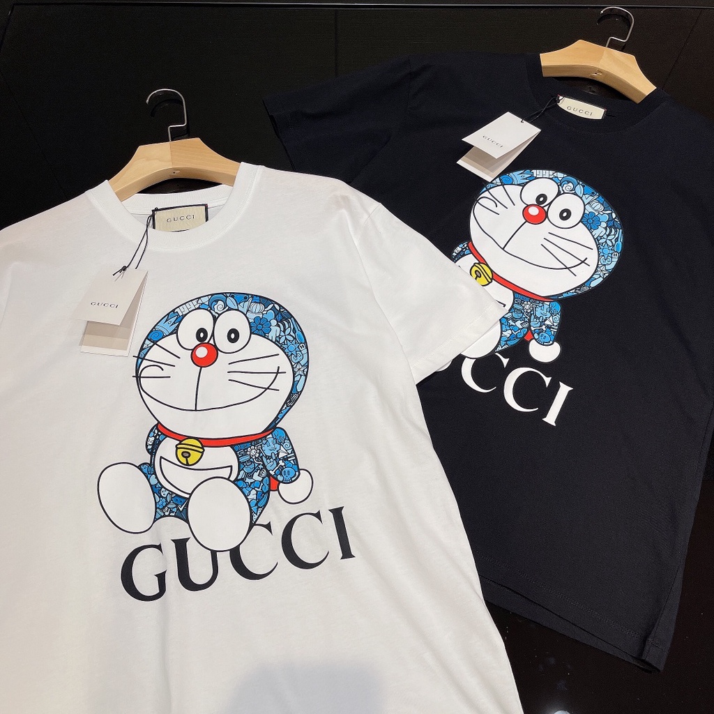 BAJU IMPORT CHINA GUCCI DORAEMON