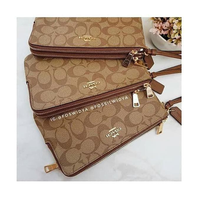

New with tag COACH Large Wristlet - Signature Saddle |ORIGINAL KUALITAS |HOTLIST | TERBARU | GROSIR