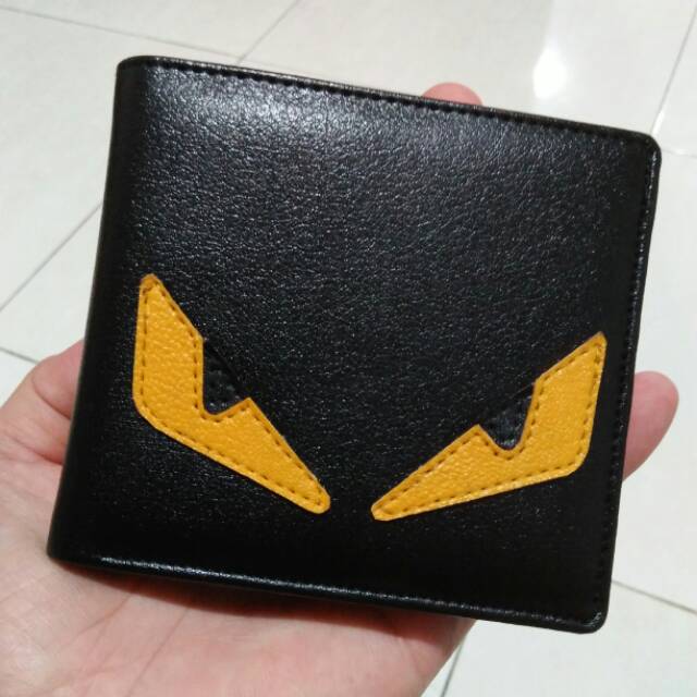 Dompet lipat pendek mata kuning