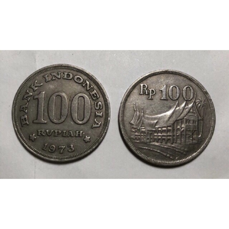 UANG KOIN 100 RUPIAH TAHUN 1973 (RUMAH GADANG) LANGKA