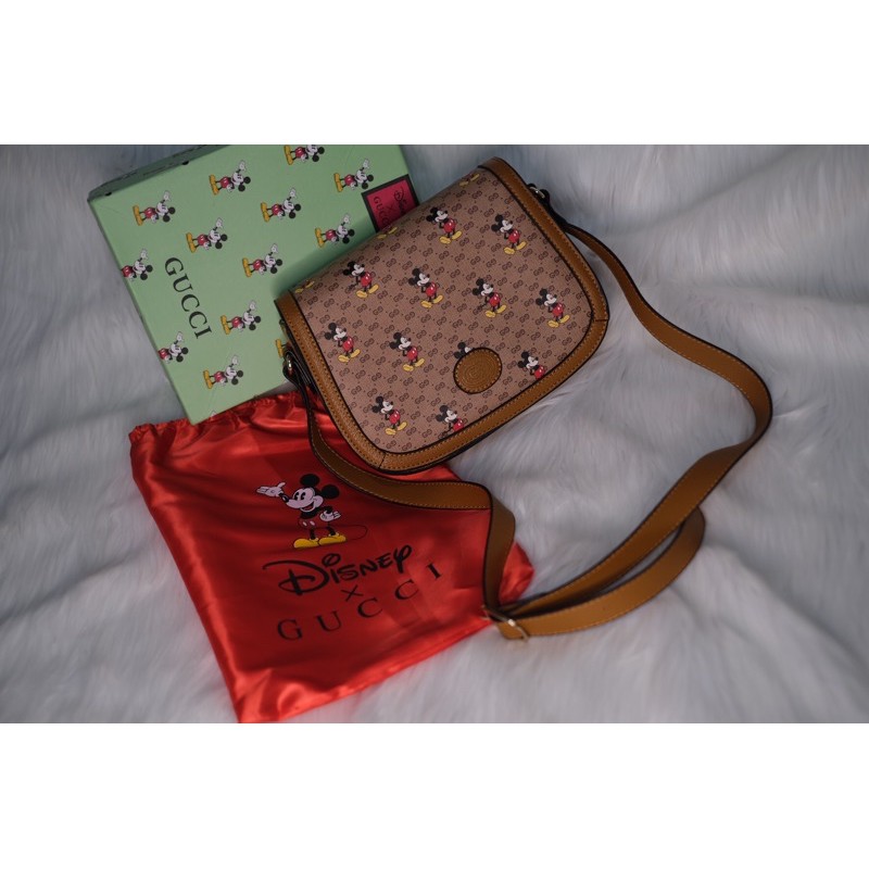 

Tas Gu*ci x Disney