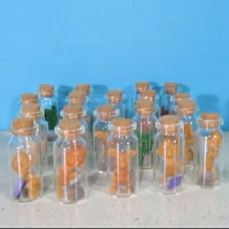 Tuyul dalam botol Magic Monster in Bottle bisa dikasih air dan berubah warna