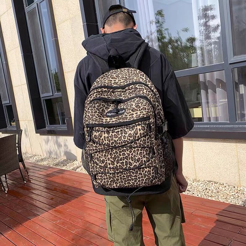 ❈▽Sera dark wind goreng street leopard print ransel untuk pria dan wanita versi Korea tas sekolah siswa kasual berkapasitas besar untuk semua pertandingan untuk pria dan wanita