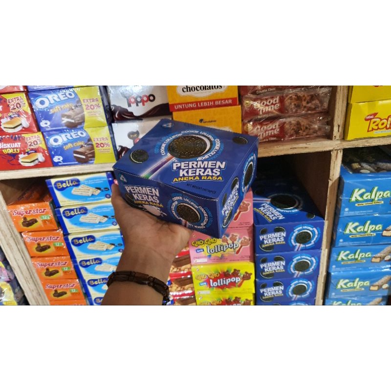 

Permen Lollypop bentuk Oreo 10 gr per box isi 30 pcs