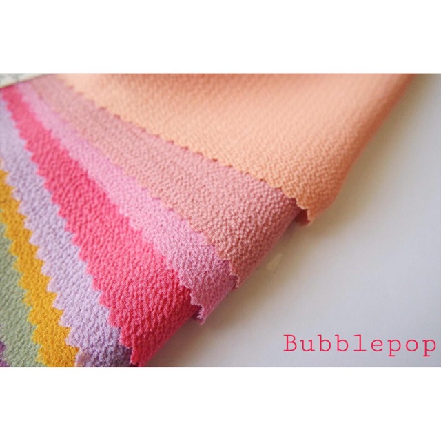 

(per 0.5 m ) KAIN BUBBLE CREPE . BUBBLE POP