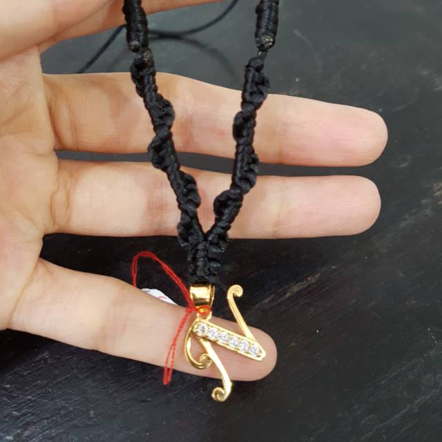 Kalung tali +liontin huruf emas 1gr
