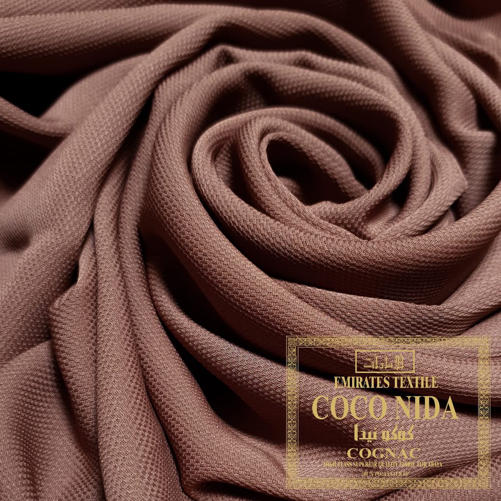 PERSETENGAH METER KAIN IMPOR COCO NIDA WARNA COGNAC BY EMIRATES