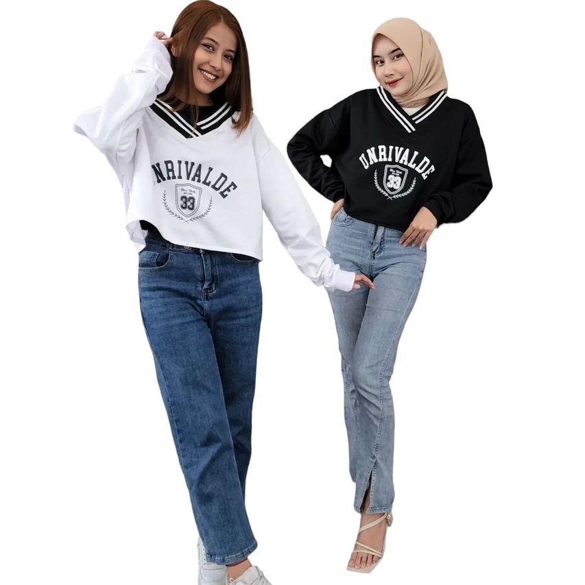 Unrivaled crop sweater berbahan fleece print