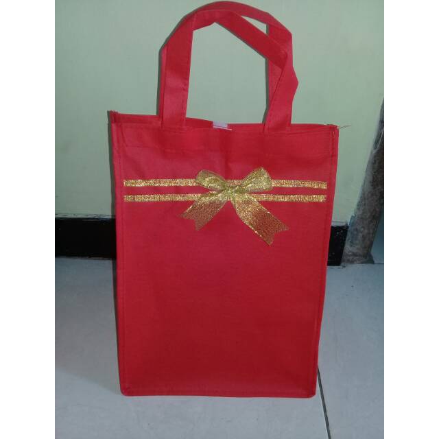 

Tas hantaran pita gold / silver