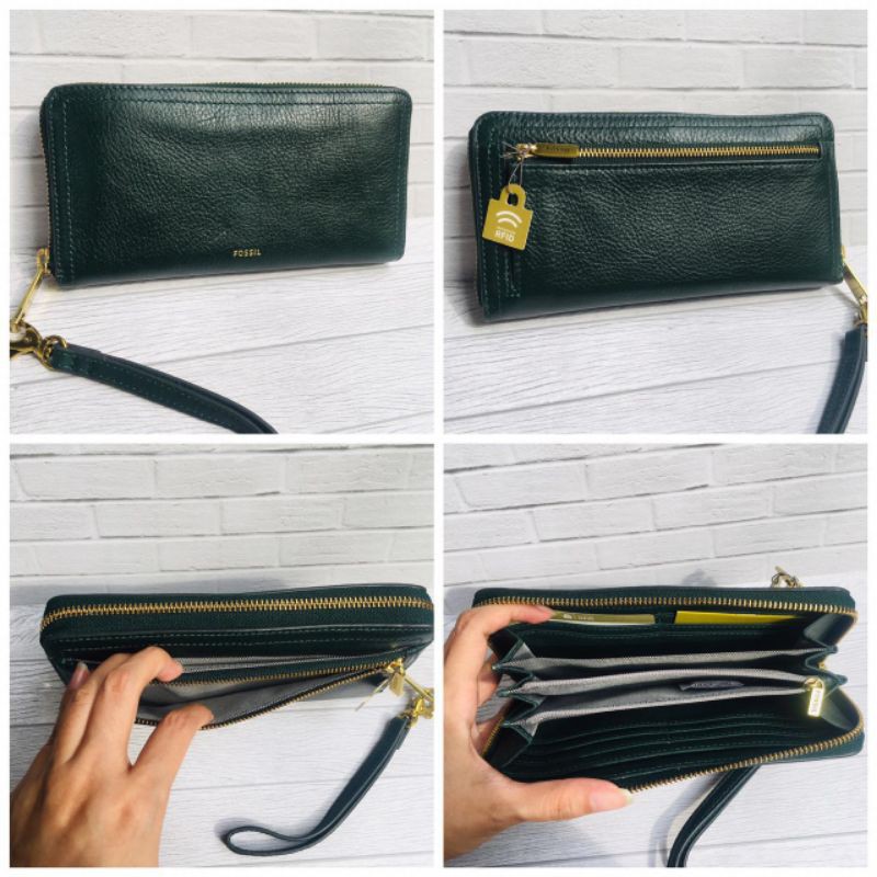 fossil logan zip clutch spruce