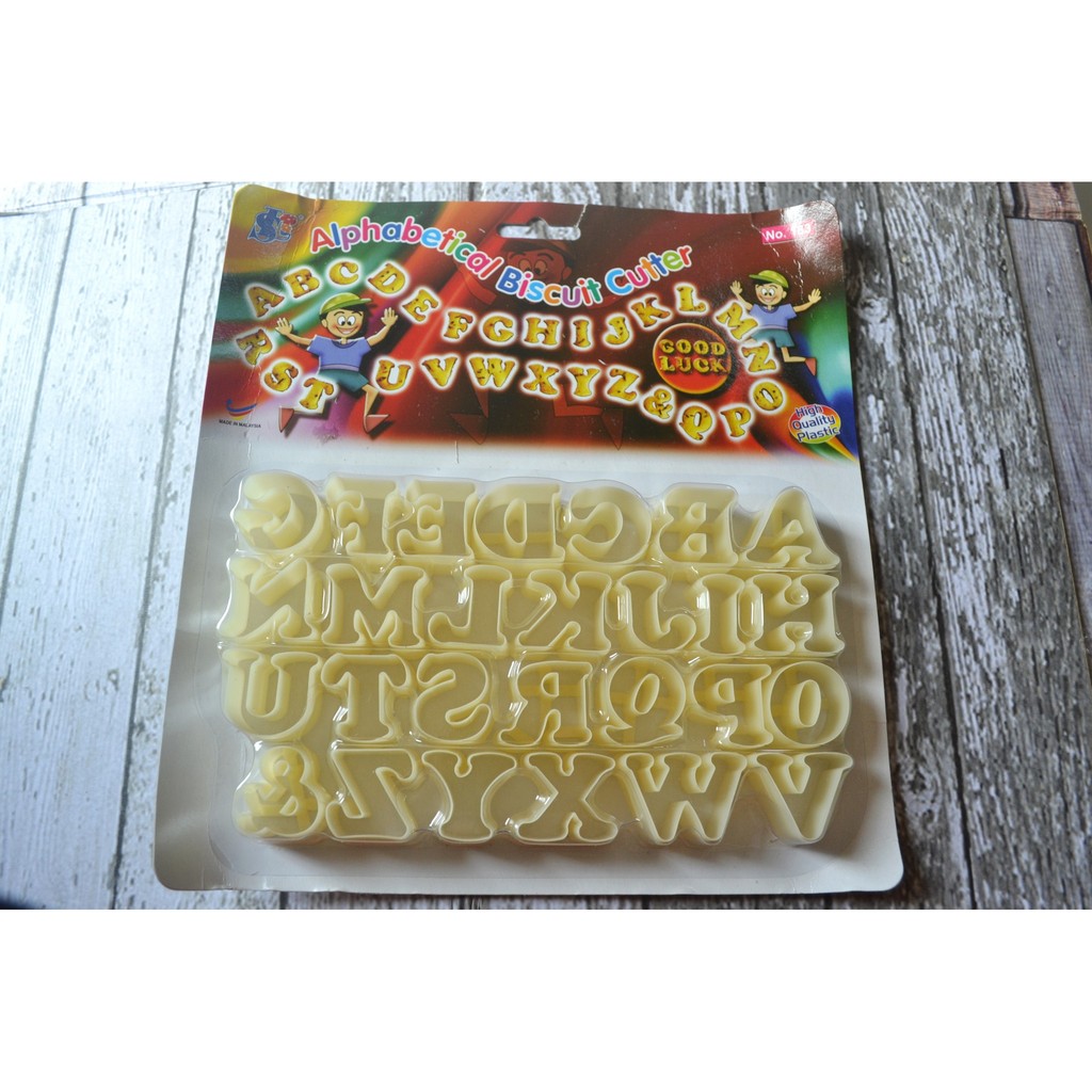 alphabet cutter cookies puding kue buah