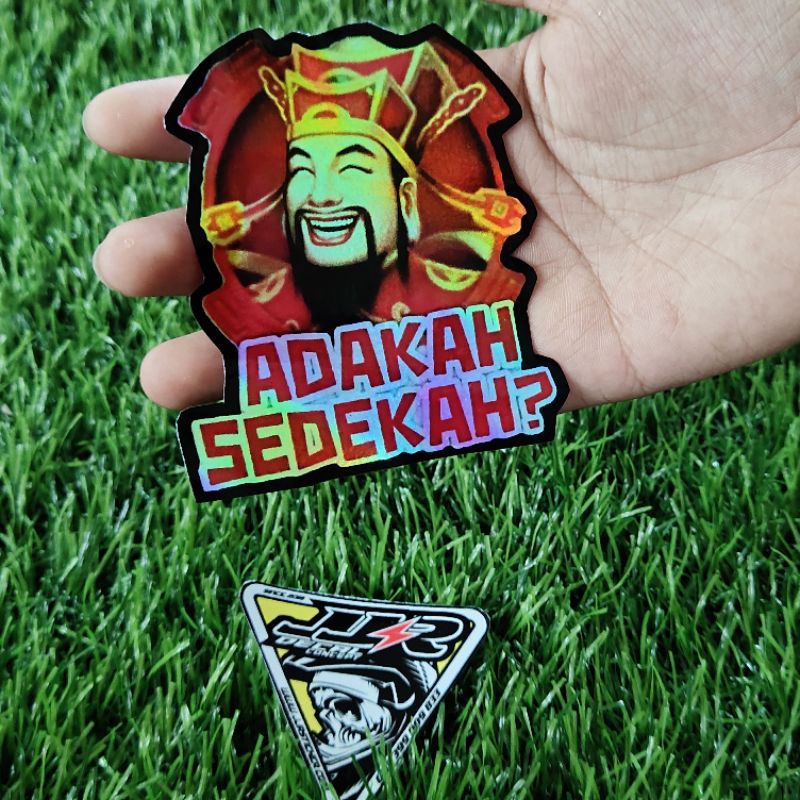 stiker hologram adakah sedrkah higs domino