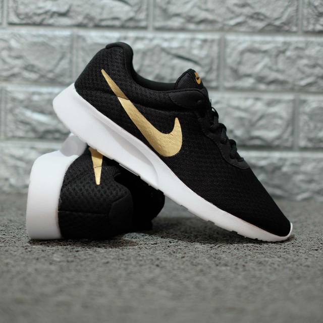 Jual nike tanjun black gold unisex 