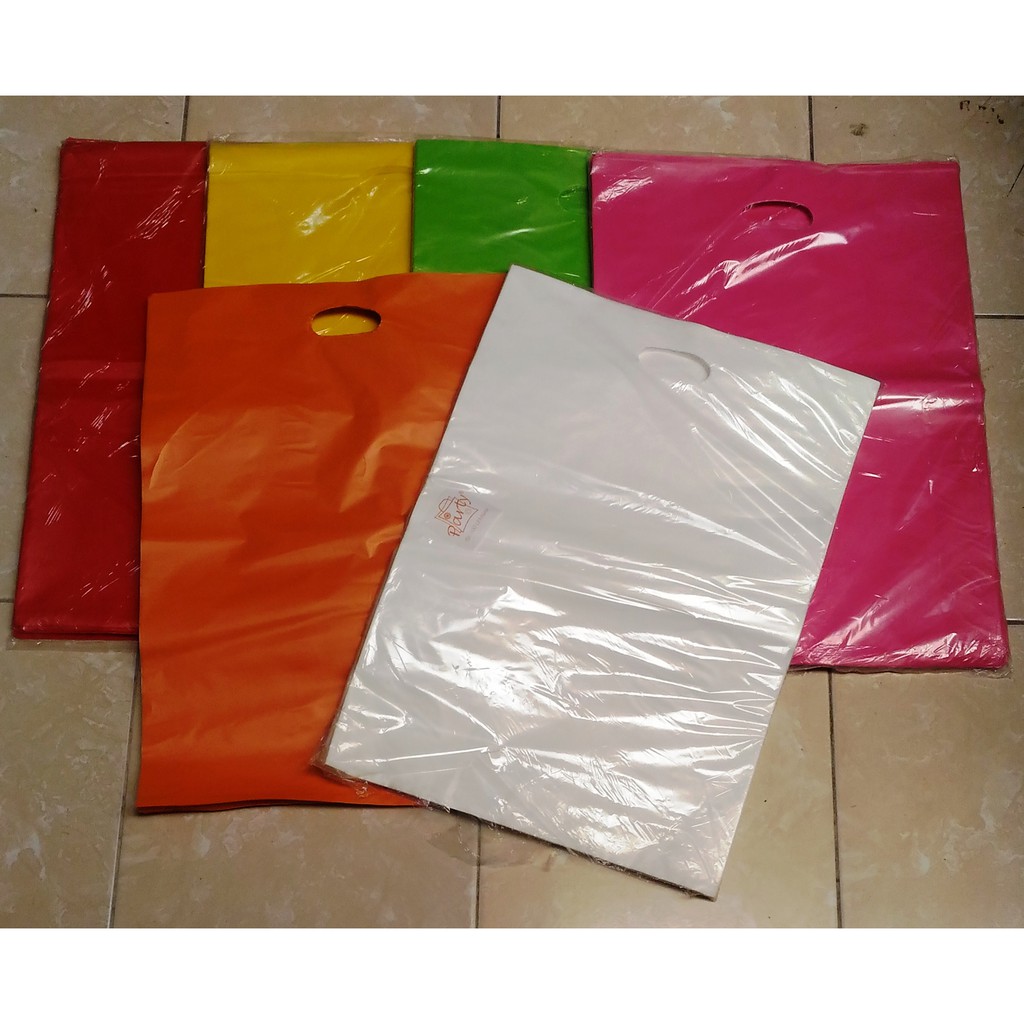 

Plastik kemasan bungkus polos warna ukuran 35 x 50 putih tebal