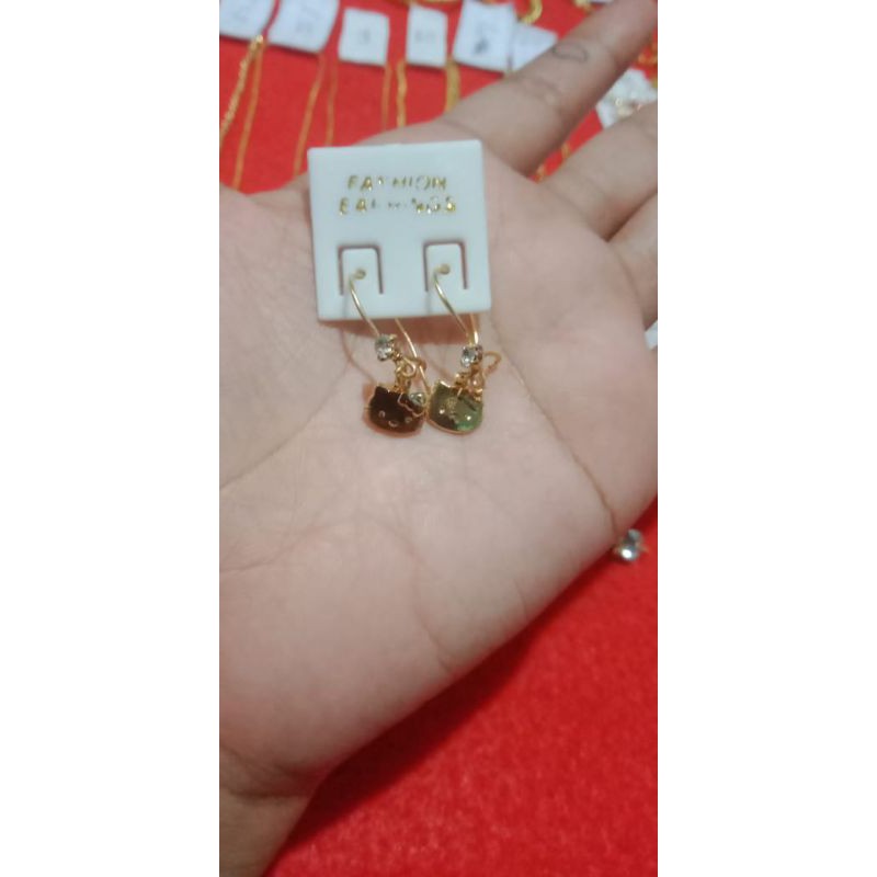 anting berbahan dasar koin uang 1991