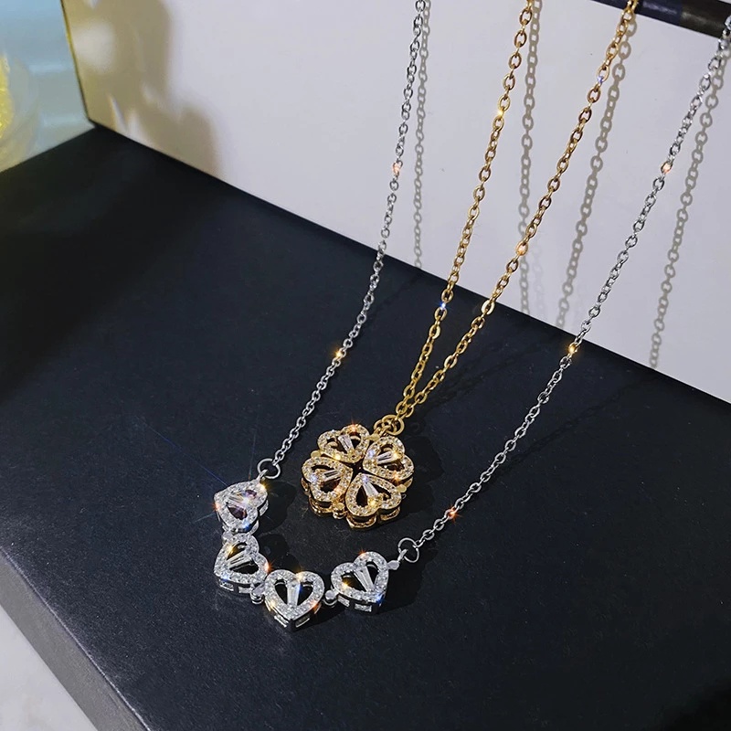 Kalung Liontin Magnetik Bentuk Daun Clover Micro Inlay Zircon Gaya Korea Untuk Wanita