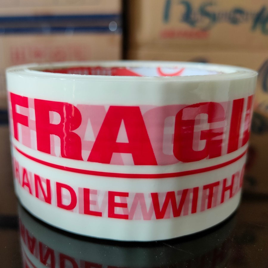 

Lakban Fragile Putih/Plakban Fragile Pecah Belah Jangan dibanting