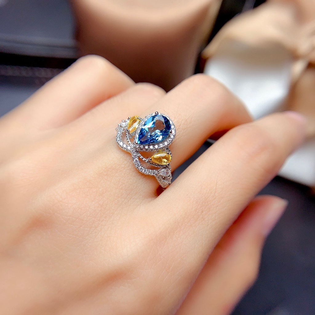 Cincin Model Terbuka Desain Mahkota Hias Topaz Biru Gaya Simple Untuk Wanita