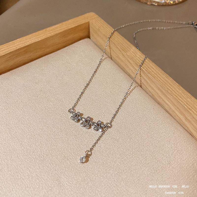 Kalung Choker Rantai Panjang Liontin Bunga Zircon Bahan Titanium Untuk Wanita