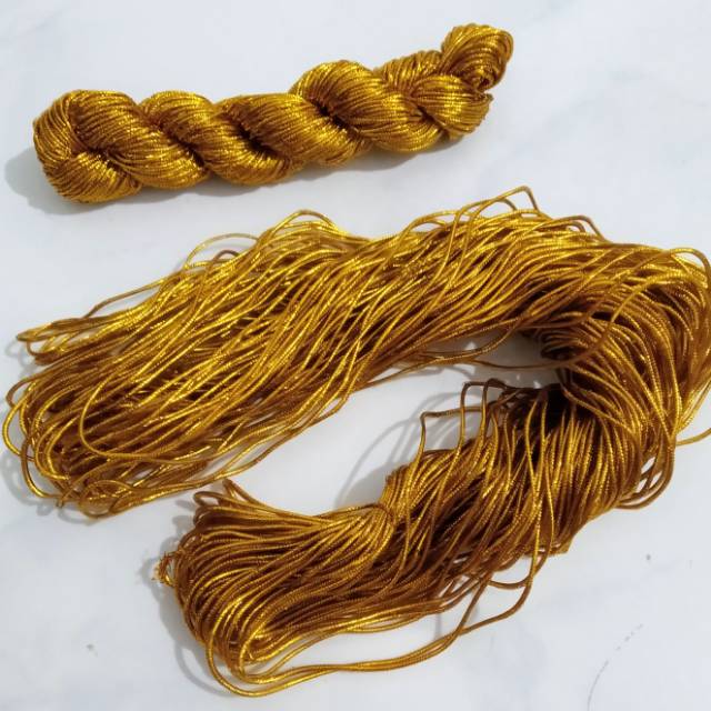 Tali emas tali souvenir