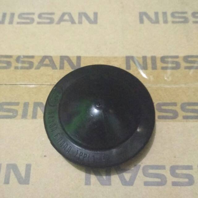 Tutup baut shock grand livina evalia