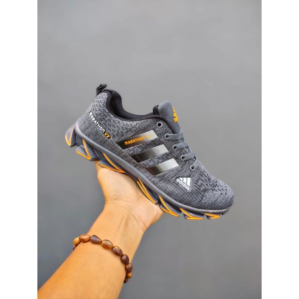 adidas grey and yellow trainers