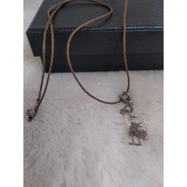 kalung wayang perak bakar