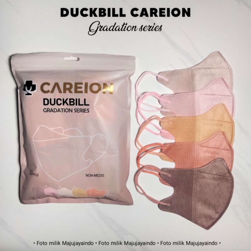 Masker DUCKBILL CAREION GRADATION SERIES Warna Pastel Peach Pink Pack isi 50