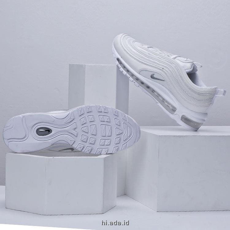 white color sports shoes