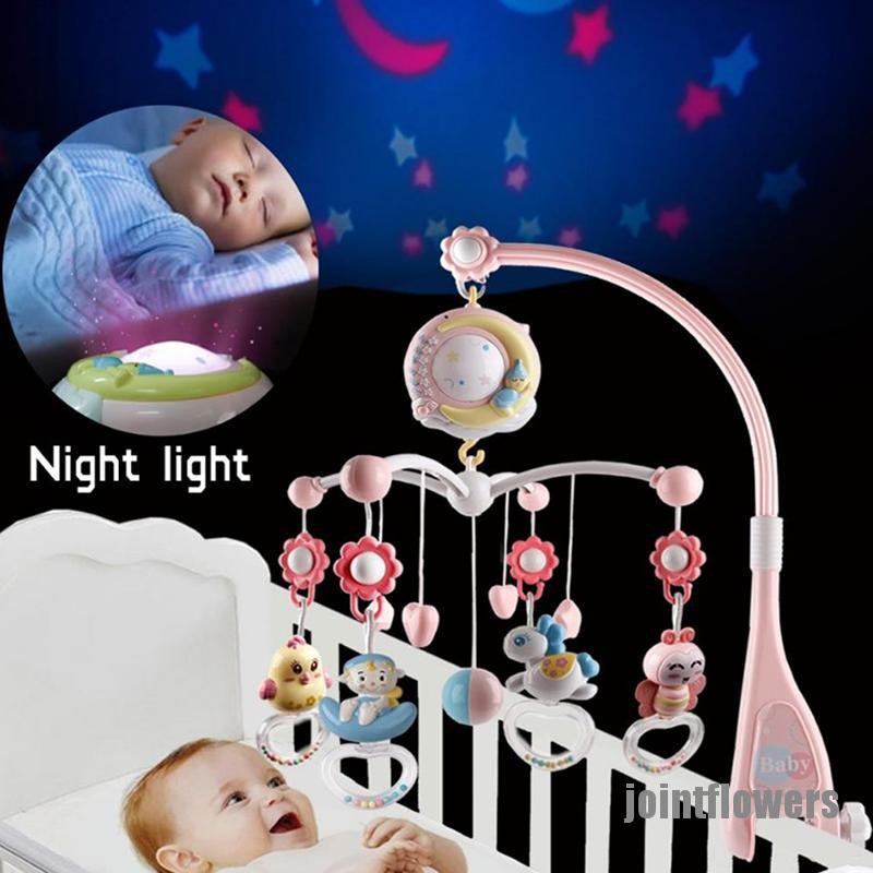 cot bed musical toys