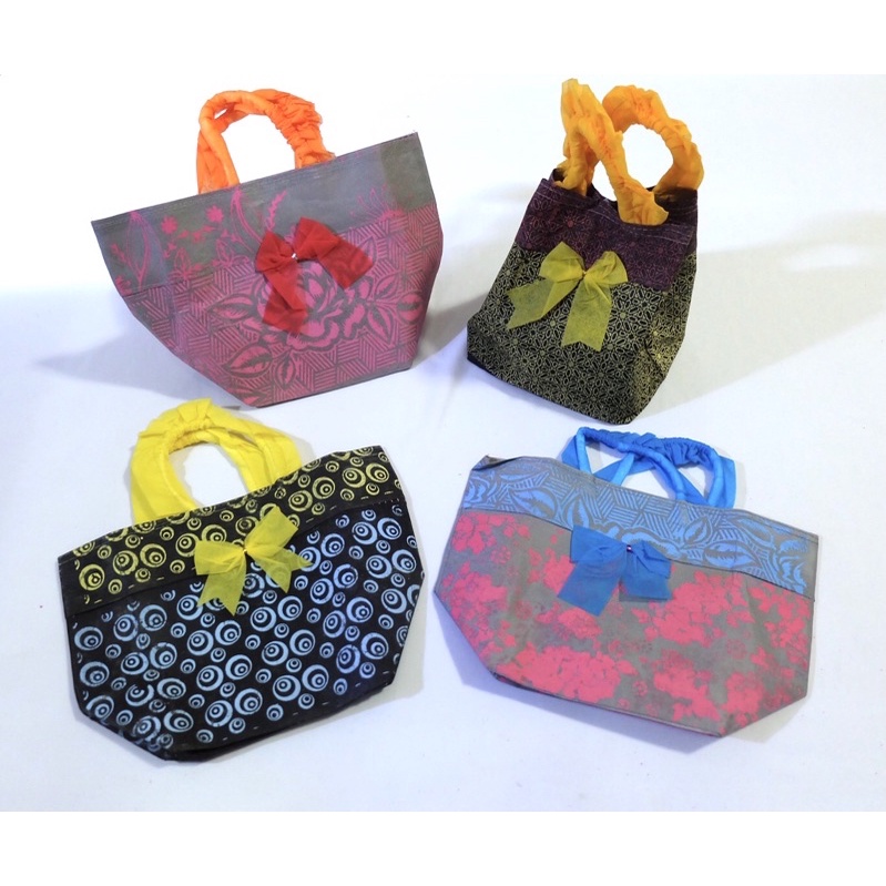 

tas kain spunbound snack batik mini warna isi 12