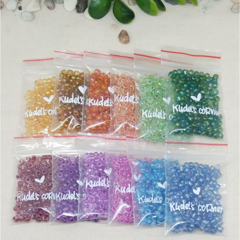 Manik Mote pasir pelangi 6/0 (4mm) per 10gr