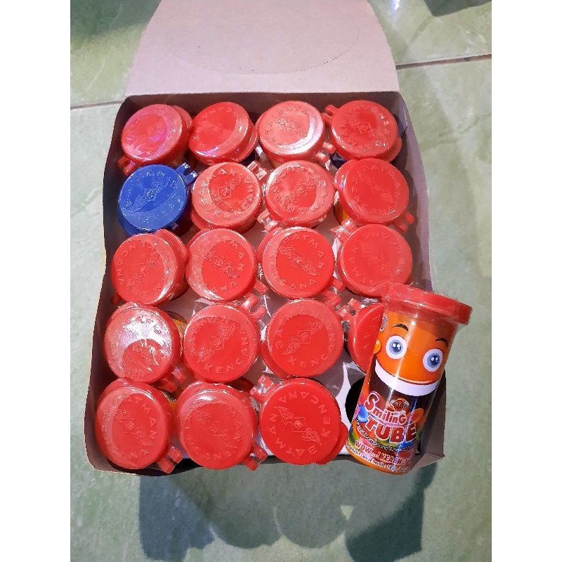 

permen cokelat smilling tube